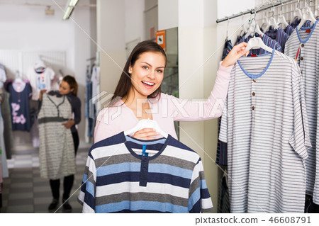 Girl shopping sleepwear for man 46608791