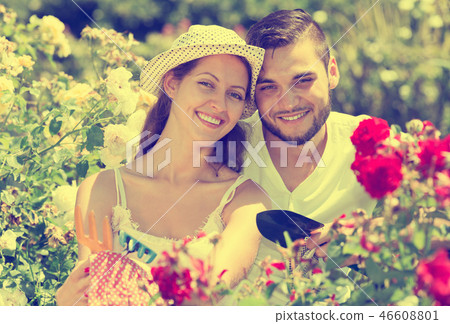 Young family gardening 46608801