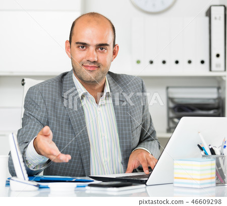 Man office worker in grey jacket offering one's hand 46609298