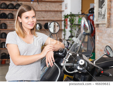Portrait of young female who is standing smile Portrait of young female who is standing smile 46609681