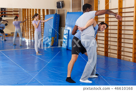 Two men practicing self defense techniques 46610168