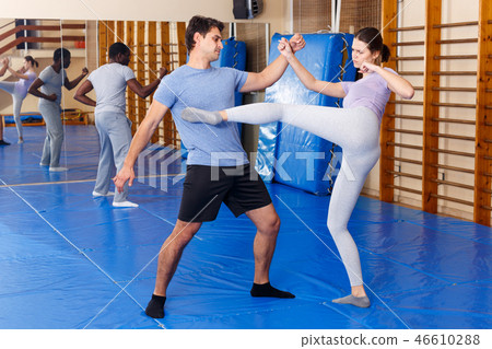People practicing self defense techniques People practicing self defense techniques 46610288