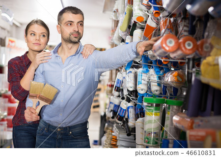 couple choosing roller for repair couple choosing roller for repair 46610831