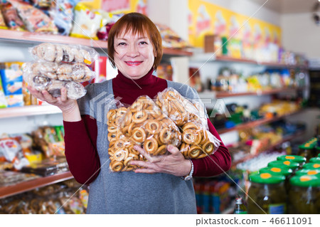 woman consumer with bakery products woman consumer with bakery products 46611091