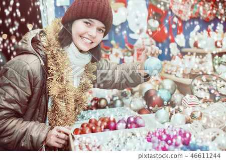 Teenage girl shopping at festive fair before Xmas 46611244