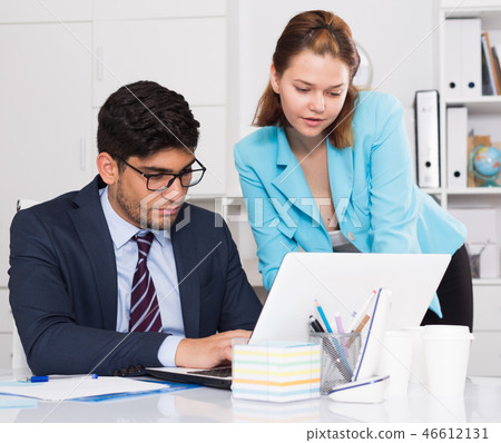 Business partners working in office Business partners working in office 46612131