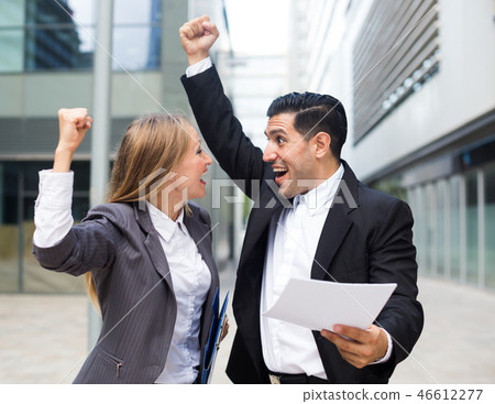 Businessman and his boss woman are signed successful contract 46612277