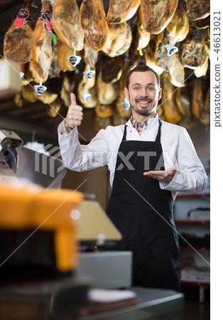 Seller offering sorts of meat 46613021