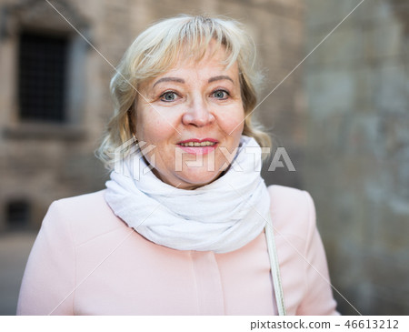 Female in the city in scarf and coat Female in the city in scarf and coat 46613212
