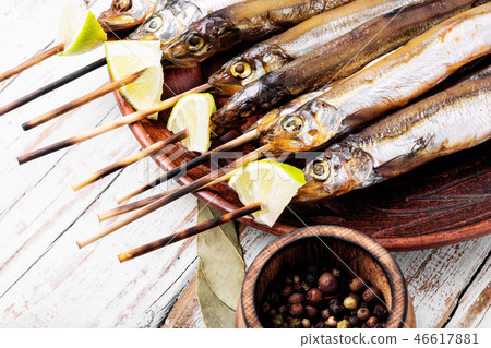 Appetizing smoked fish 46617881