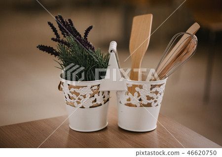 Kitchen accessories in the style of Provence. Devices for cooking from natural wood. Lavender in a Kitchen accessories in the style of Provence. Devices for cooking from natural wood. Lavender in a 46620750