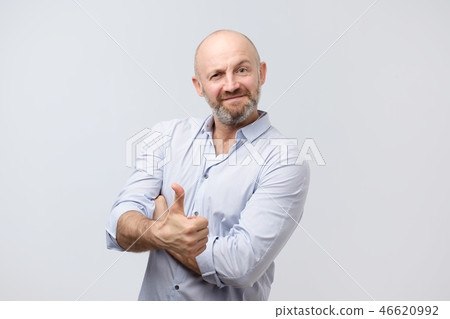 Young european man with thumb up. Positive mood Young european man with thumb up. Positive mood 46620992