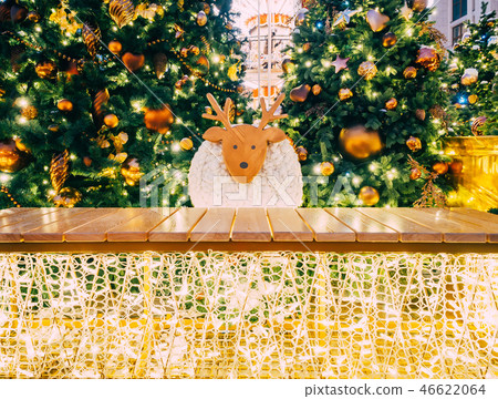 Christmas decorated fir trees with toys and garlands. New Year and Christmas background. Decorative 46622064