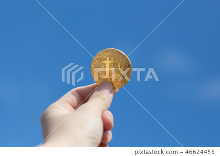 Bitcoin and hand 46624455