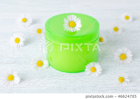 care products, natural cream with fresh chamomile flowers care products, natural cream with fresh chamomile flowers 46624785