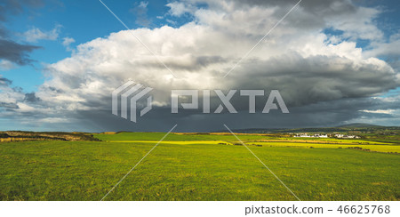 Rainy sky above the green field. Northern Ireland. Rainy sky above the green field. Northern Ireland. 46625768