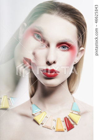 Sexy nude lady in colorful neacklace and artistic makeup Sexy nude lady in colorful neacklace and artistic makeup 46625843
