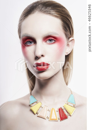 Sexy nude lady in colorful neacklace and artistic makeup 46625846