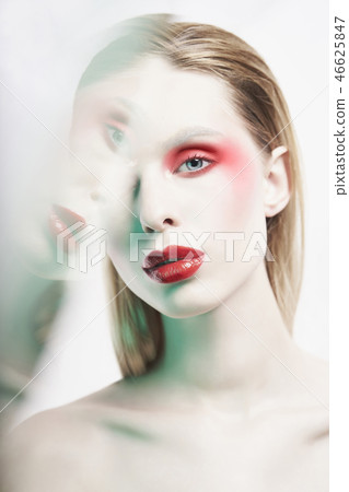 Sexy nude lady with colorful lipstick and artistic makeup 46625847