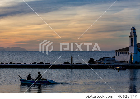 Fishermen Silhouettes near Greek Church at dawn Fishermen Silhouettes near Greek Church at dawn 46626477