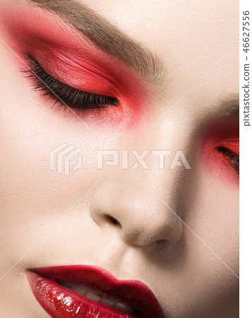 Young beautiful woman with fashion make up 46627556