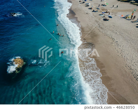 Aerial View From Flying Drone Of People Relaxing Aerial View From Flying Drone Of People Relaxing 46628050