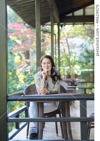 Middle senior woman restaurant wine travel image 46629978