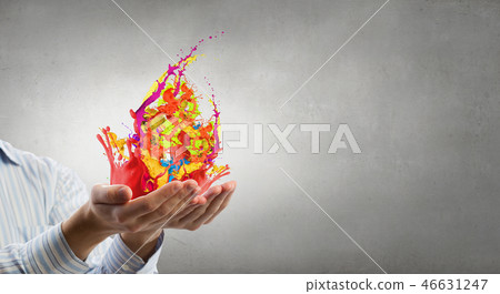 Colorful splashes in palms 46631247