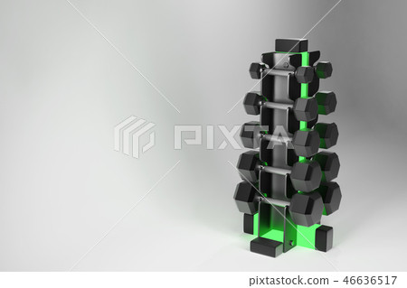 3D rendering. Set of isolated dumbbells for sport on a white background folded on a special black 3D rendering. Set of isolated dumbbells for sport on a white background folded on a special black 46636517