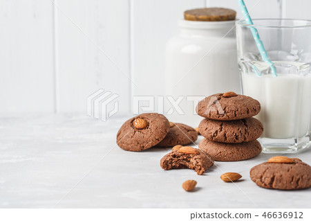 Chocolate cookies with almonds on white Chocolate cookies with almonds on white 46636912