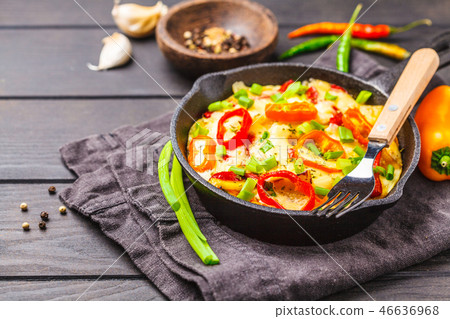 Traditional fritatta with peppers and potatoes 46636968