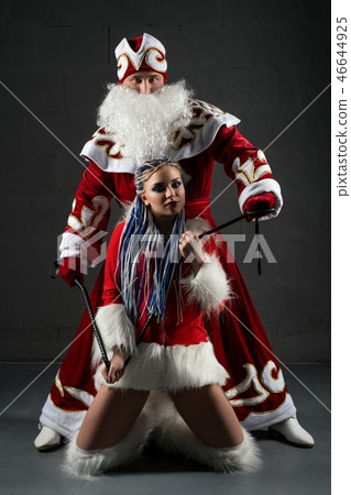 Santa Claus and Snow Maiden tied on a leash Santa Claus and Snow Maiden tied on a leash 46644925