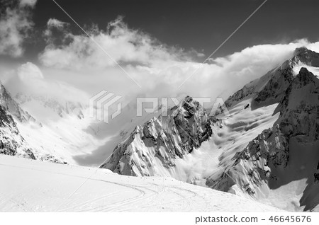 Black and white view on snowy slope Black and white view on snowy slope 46645676