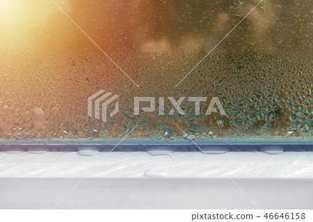 window with water drops closeup, inside, condensation 46646158