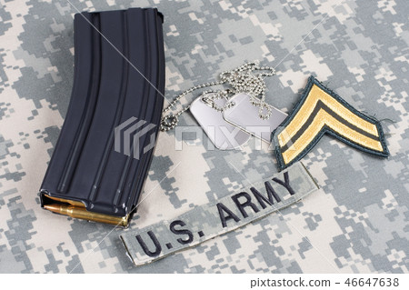Ammunition on camouflage US Army uniform 46647638