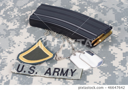 Ammunition on camouflage US Army uniform 46647642