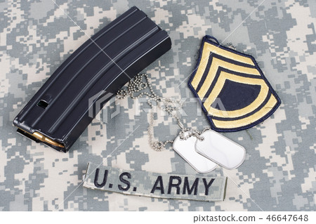 Ammunition on camouflage US Army uniform 46647648