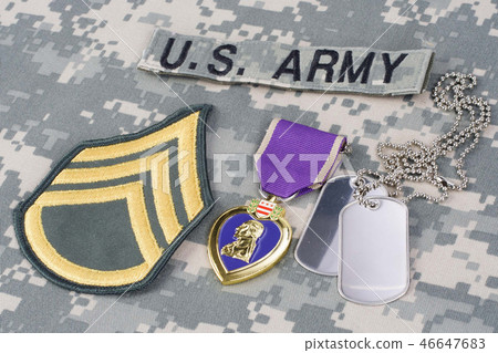 Purple Heart award on camouflage uniform 46647683