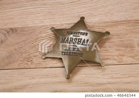 Western-style sheriff badge Western-style sheriff badge 46648344