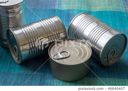 Tin cans with food. Conserved food.  46648407