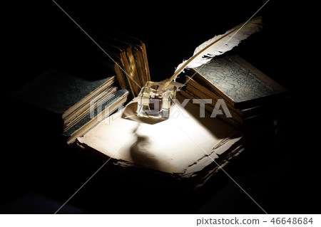 Old fountain pen, papers and inkwell on a black Old fountain pen, papers and inkwell on a black 46648684
