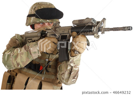 soldier with assault rifle on white background 46649232