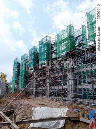 Metal scaffolding at the construction site  46650040