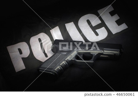 Police weapon and equipment on black uniform  46650061