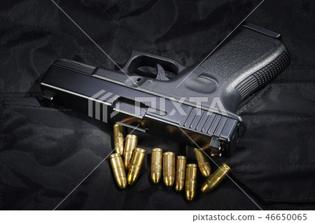 Police weapon and equipment on black uniform  46650065