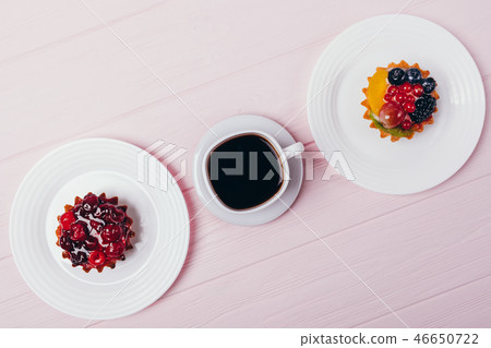 Composition of delicious small cakes with espresso Composition of delicious small cakes with espresso 46650722