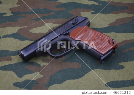9mm russian handgun on russian camouflage uniform 46651213