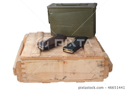 m16 and ak47 magazins on wooden box m16 and ak47 magazins on wooden box 46651441