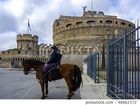 Two policemen on horseback guarding the monument 46662572
