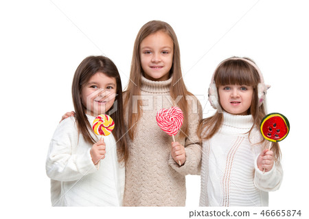 portrait of cute little kids in stylish clothes looking at camera and smiling portrait of cute little kids in stylish clothes looking at camera and smiling 46665874
